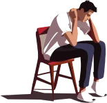 man op stoel, kijkt naar de vloer.